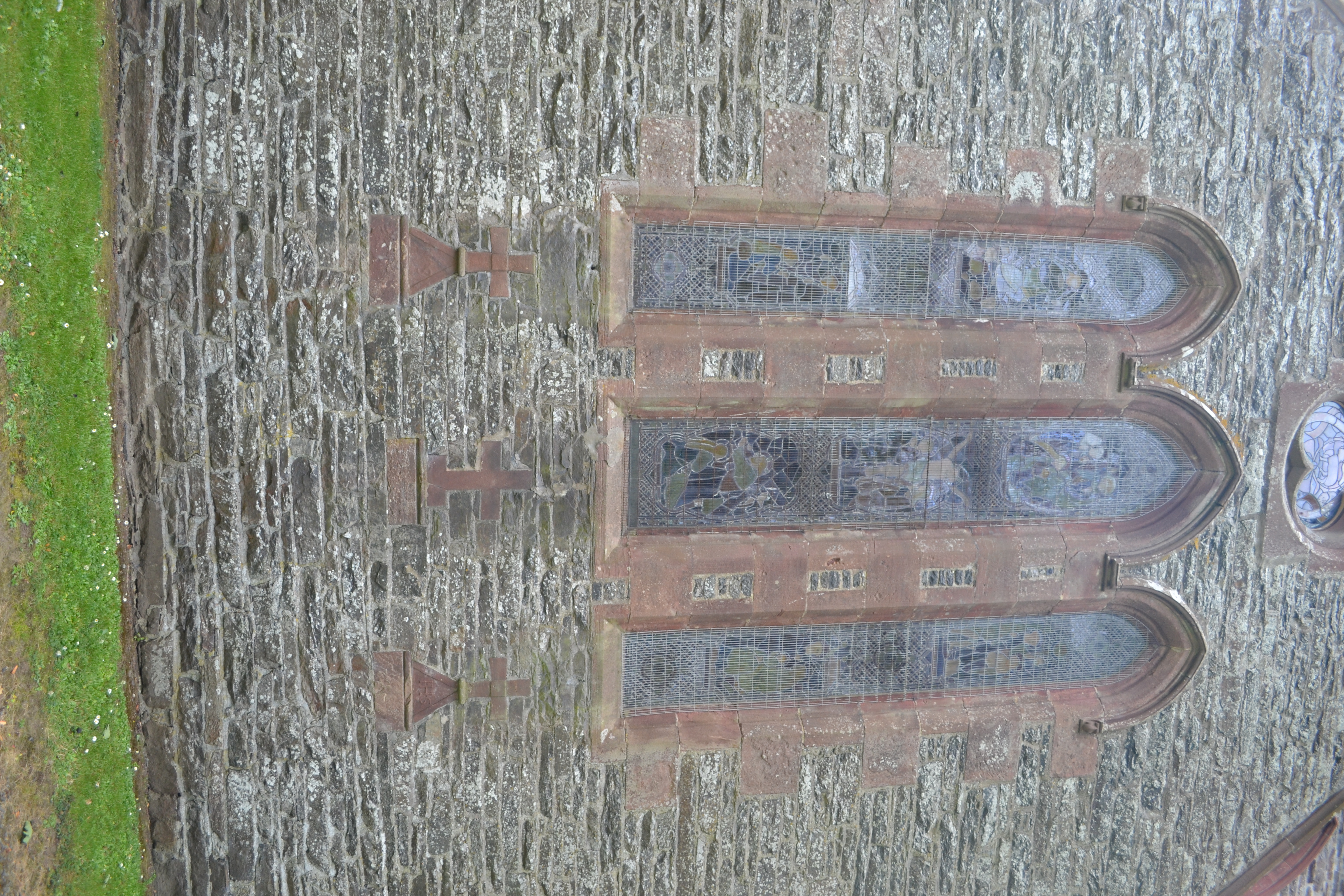 Picture of the the three cross-stones at Woodhead Episcopal Church.