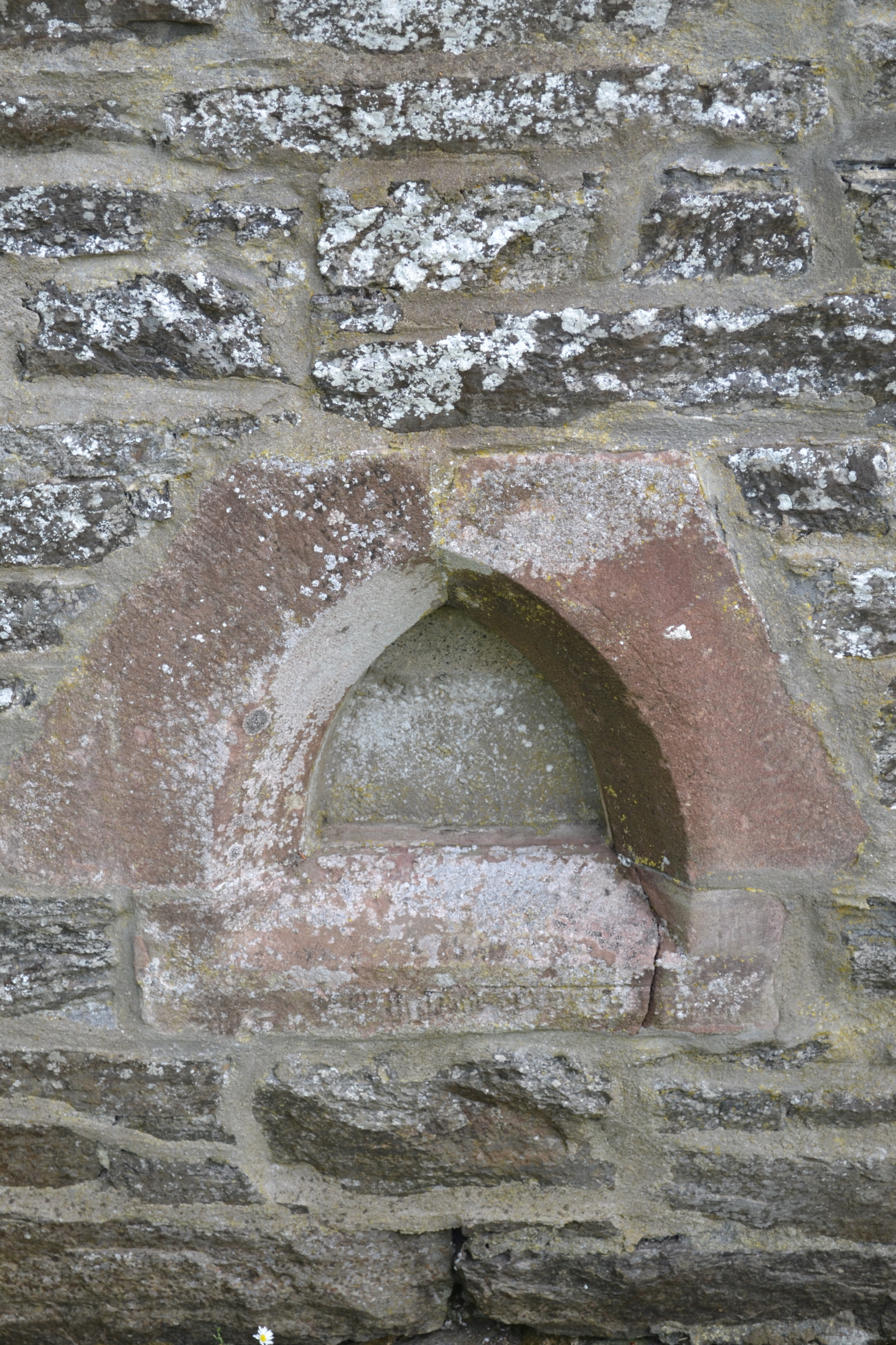 Picture The piscina set into the north-facing gable of Woodhead Episcopal Church.